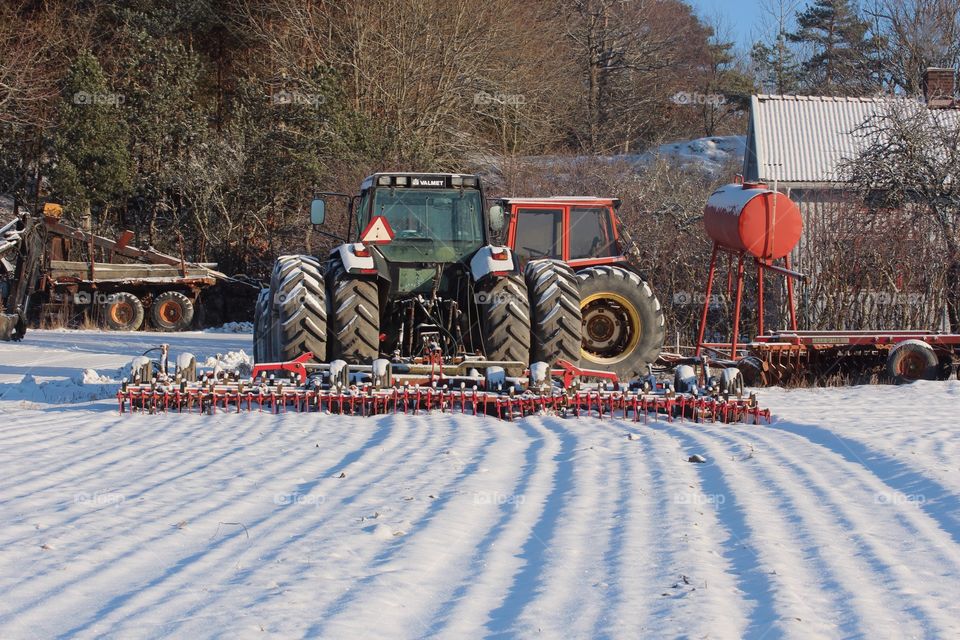 Tractor on a snowy field