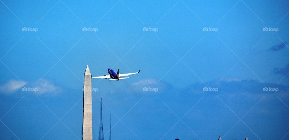 Plane and Washington Monument 