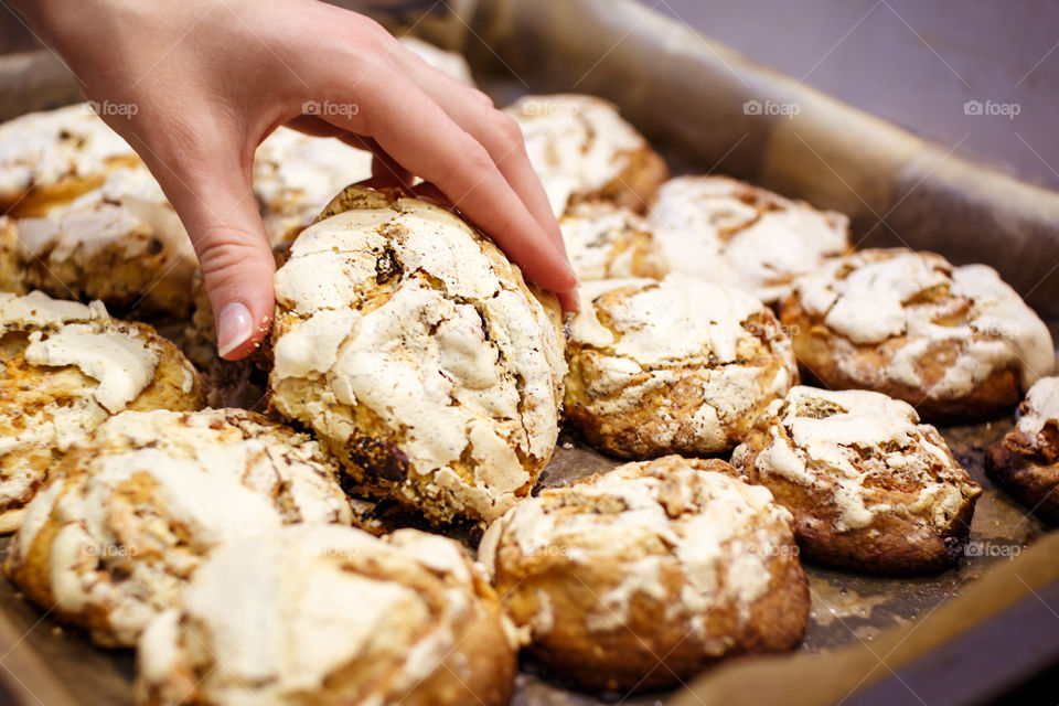 Close-up of biscuit in hand