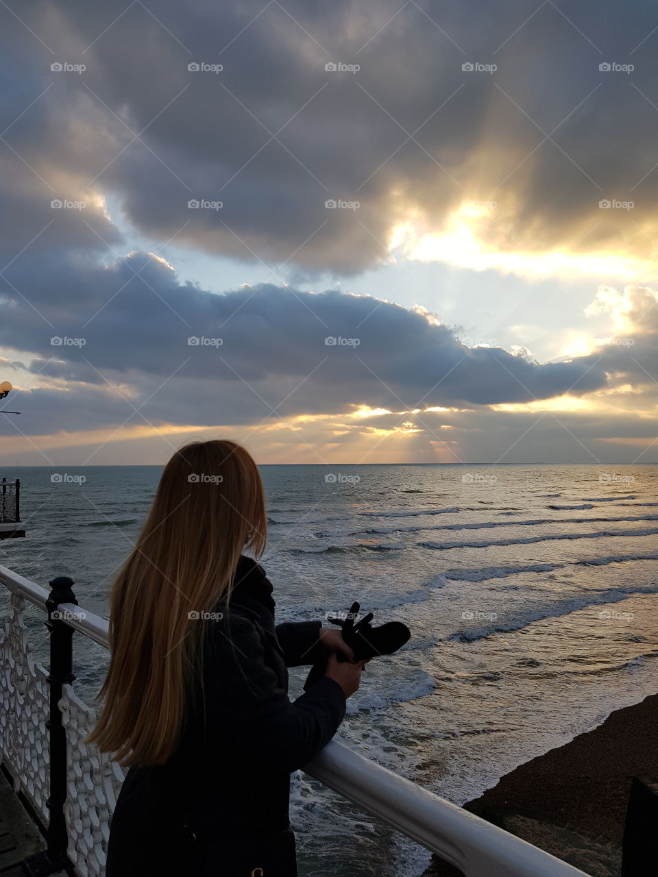 Girl watching the sunset