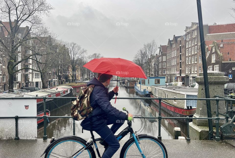 Biking to school in the rain