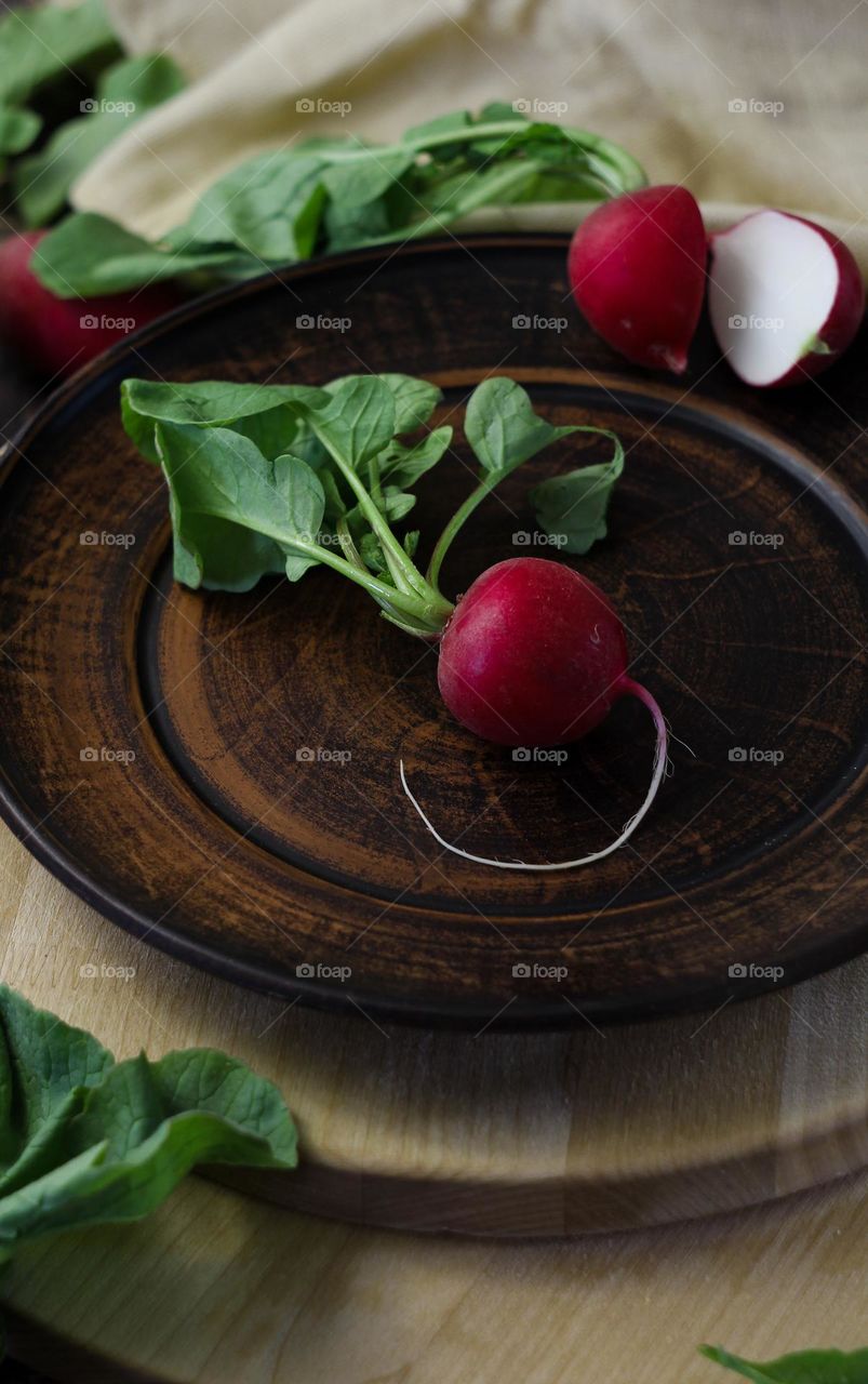 Fresh radishes on a plate