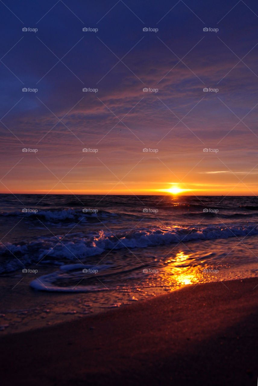 Scenic view of sea against dramatic sky