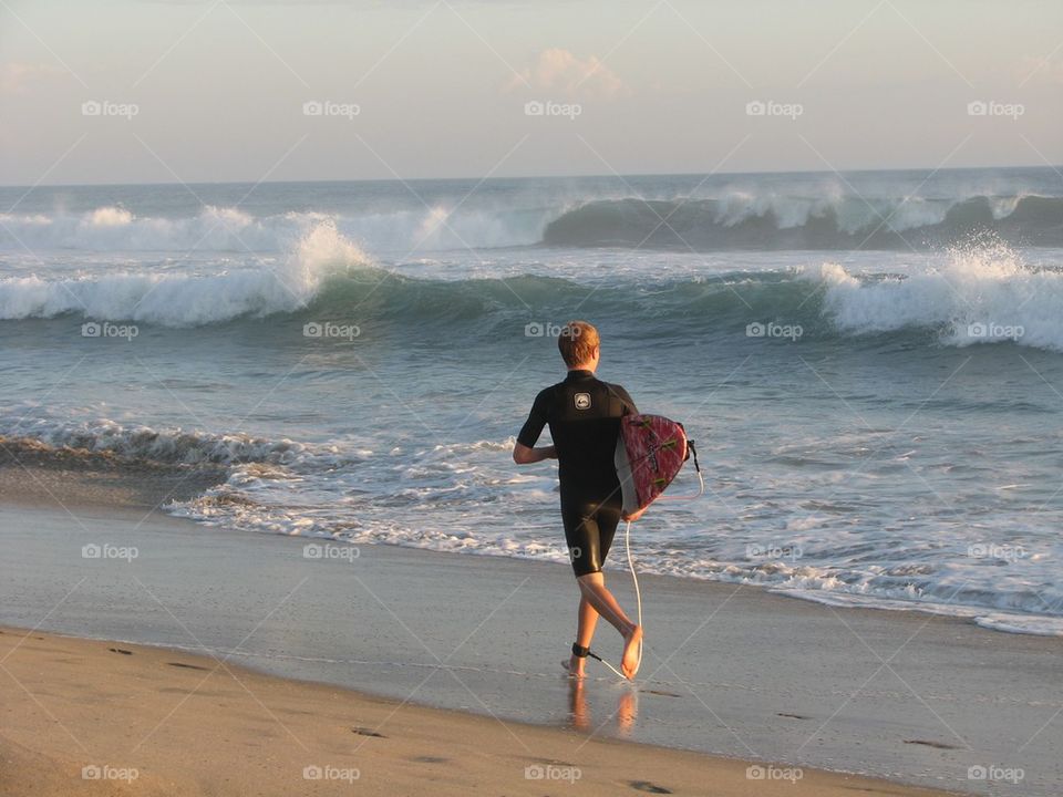 Surfer Searching for a Spot
