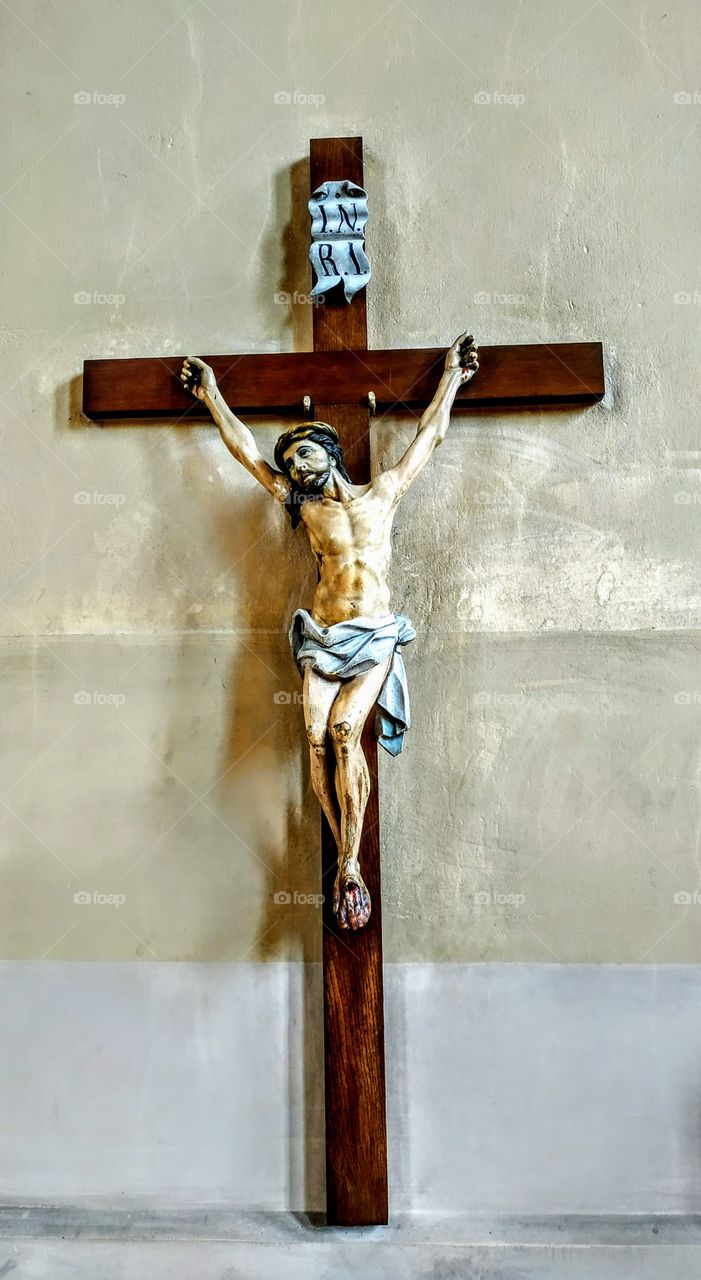 Crucifix in the catholic church. (Lithuania. Druskininkai, July, 2019).