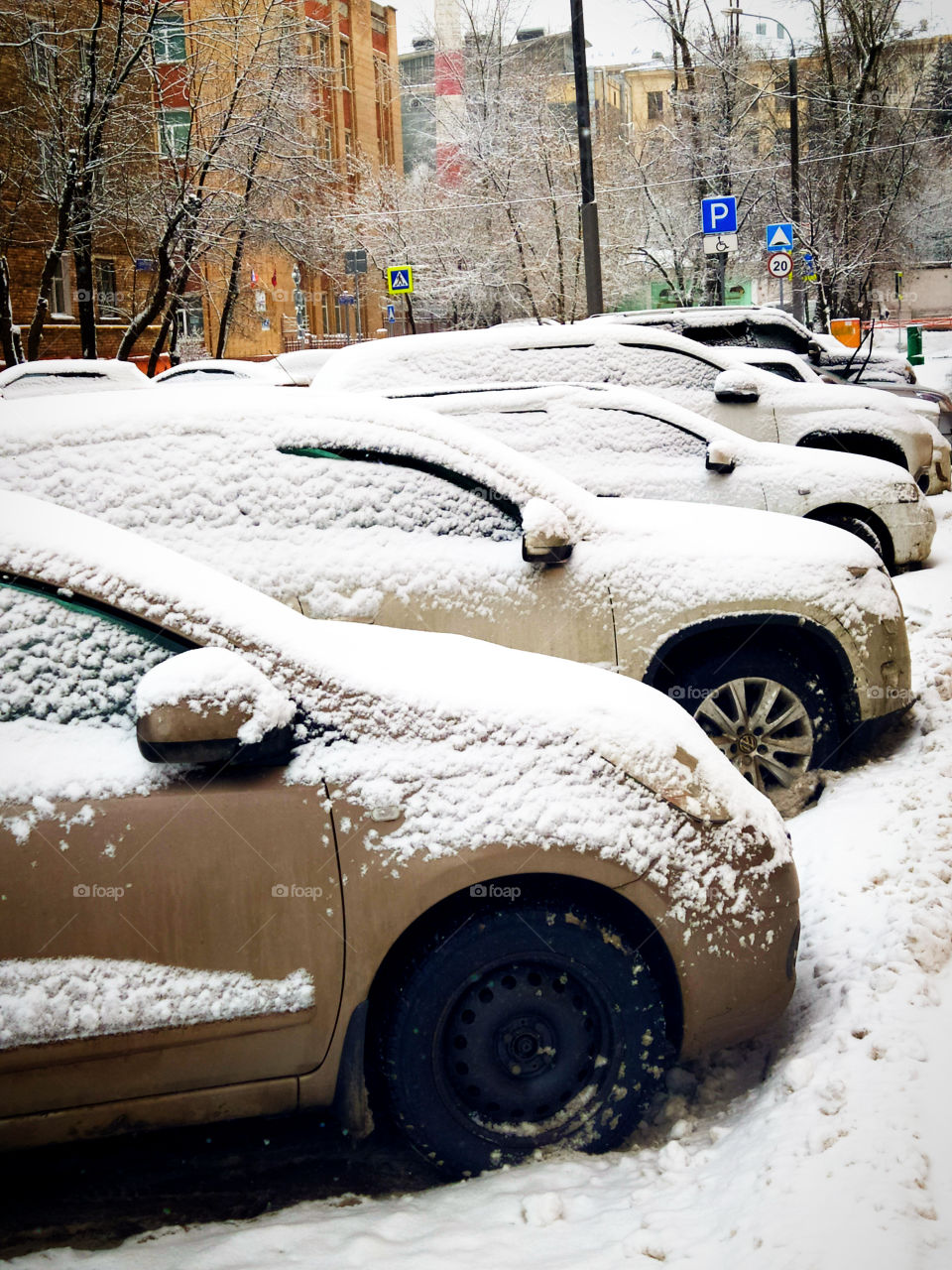 Winter has come.  Cars after snowfall