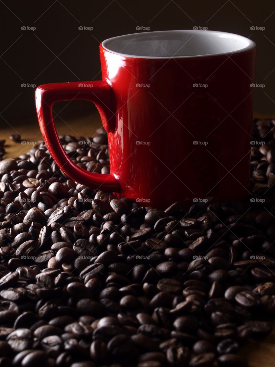 mug of coffee and coffee beans. mug of coffee and coffee beans