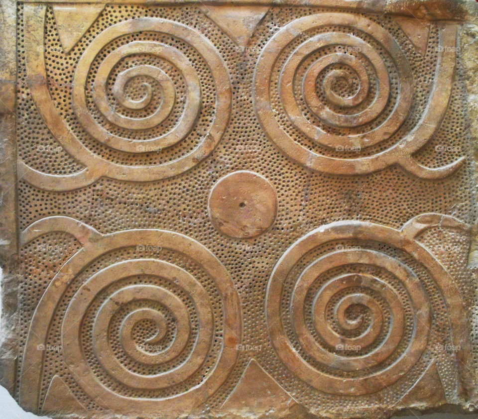 Ancient Mediterranean spiral stone carvings