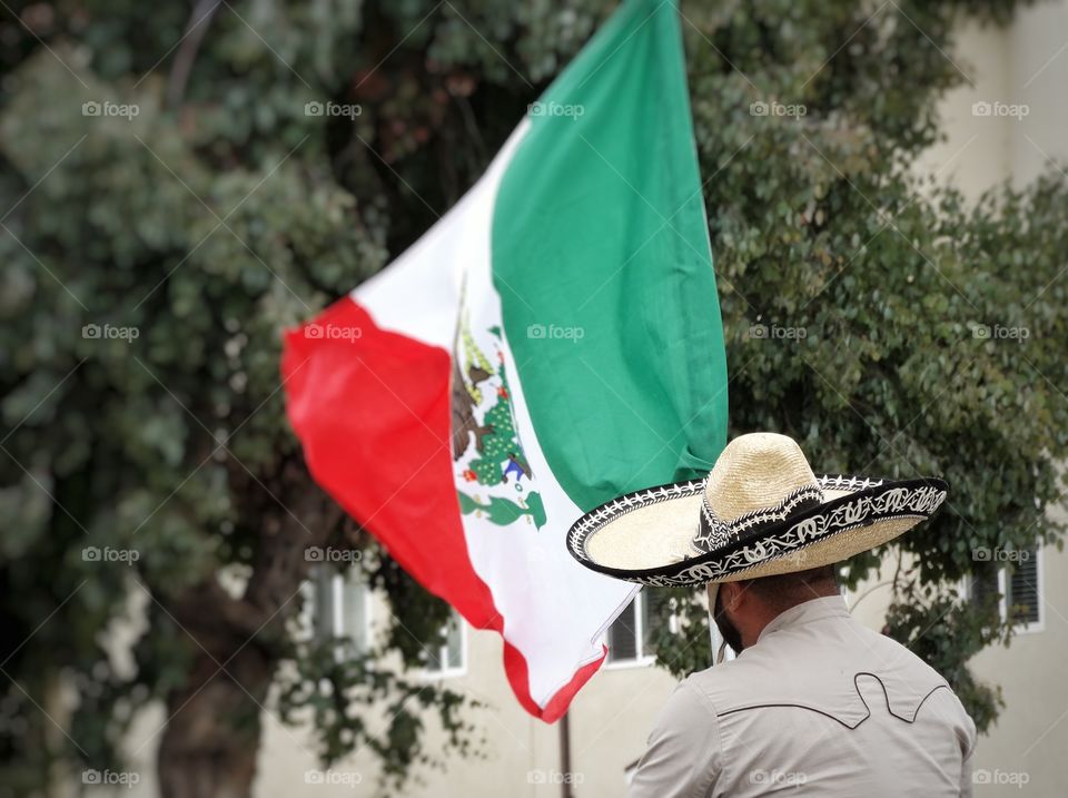 Mexican Pride. Traditional Vaquero Waving The Mexican Flag
