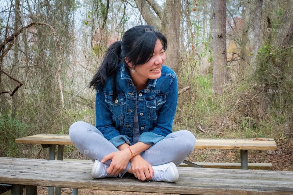 A Taiwanese lady enjoying a laugh. 