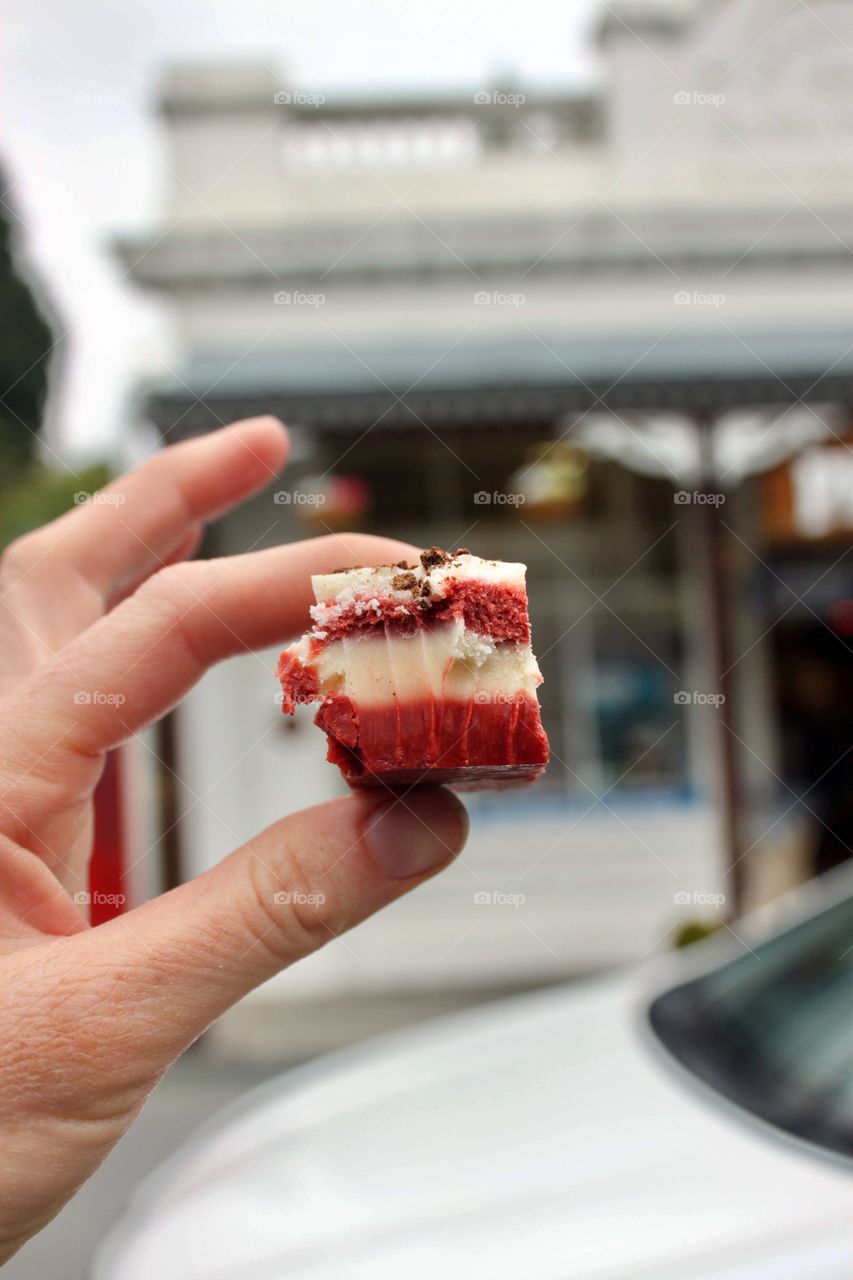 Human hand holding a fudge