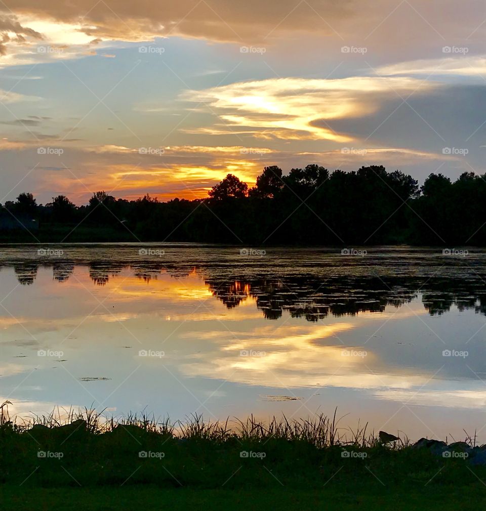 Alabama sunset reflected on a pond
