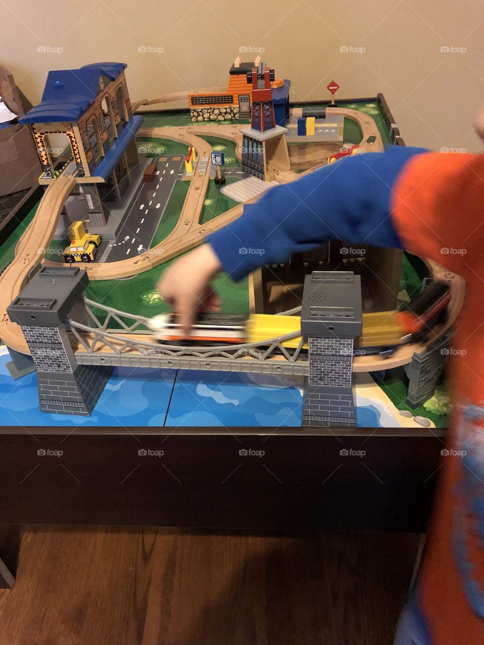 Play set for a train and some cars