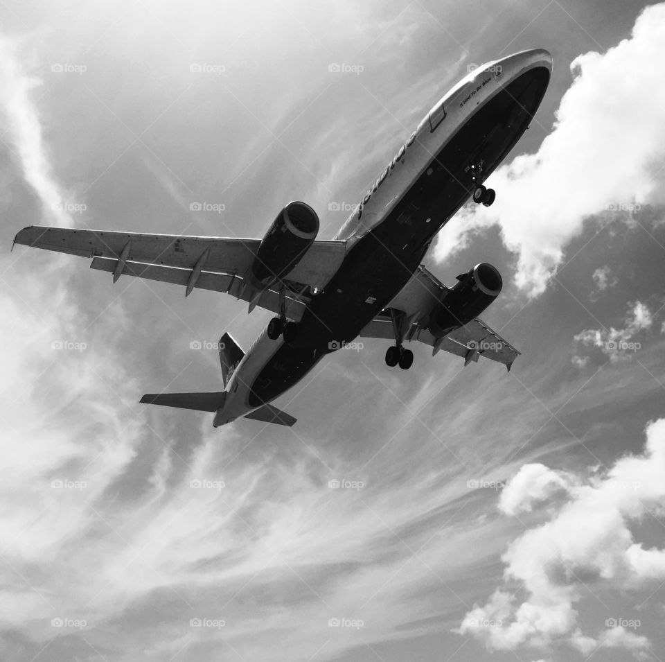 Monochrome Plane Flying Overhead, Plane In Flight, Airplane Landing, Plane In The Clouds, Air Craft And Clouds, Airplane In The Sky