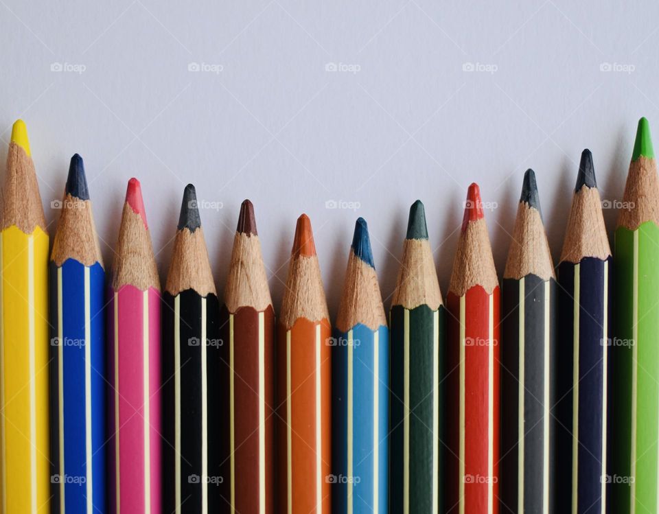 colored pencils on white background 