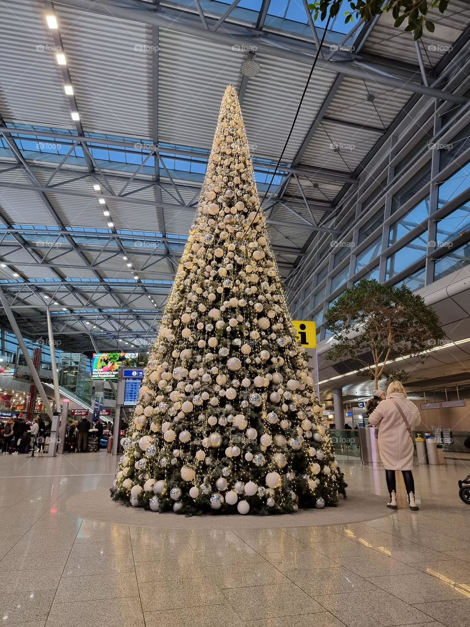 Christmas atmosphere at DUS airport; decorated Christmas tree