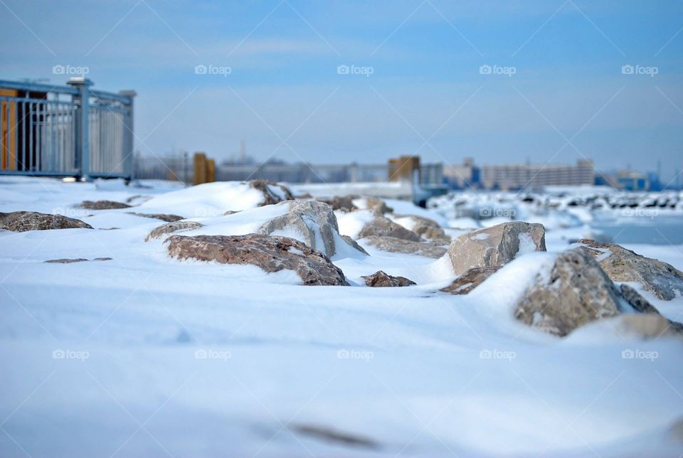 Snowy rocks at the beach