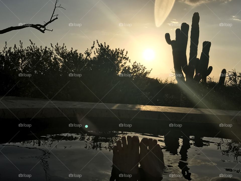 Sunset over pool