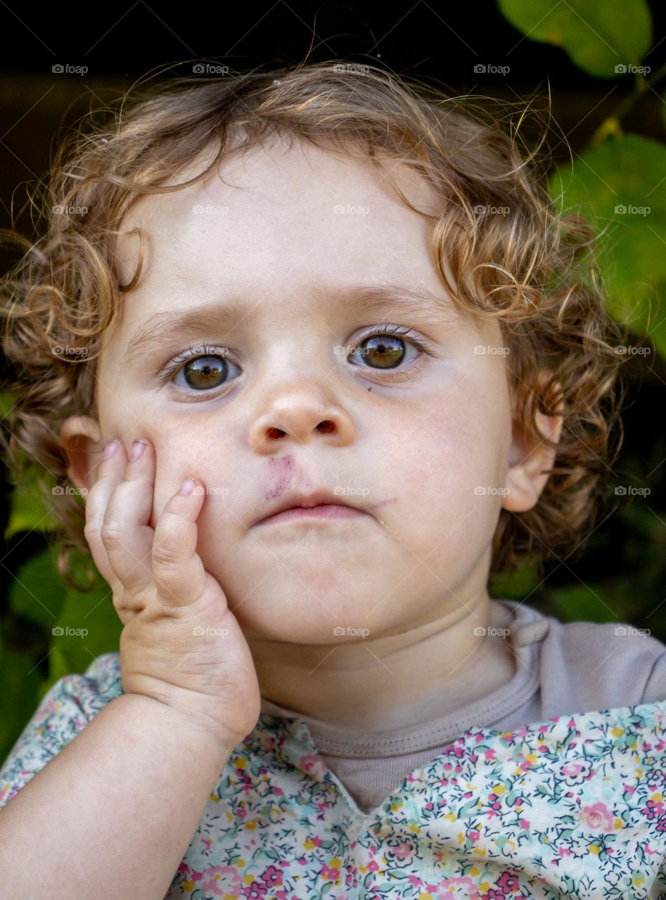 serious little girl portrait, what did she realy thinking ,i dont Know. Emotions for sure.