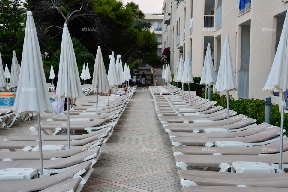 Empty deck chairs at the hotel Alcudia Pins in Majorca.