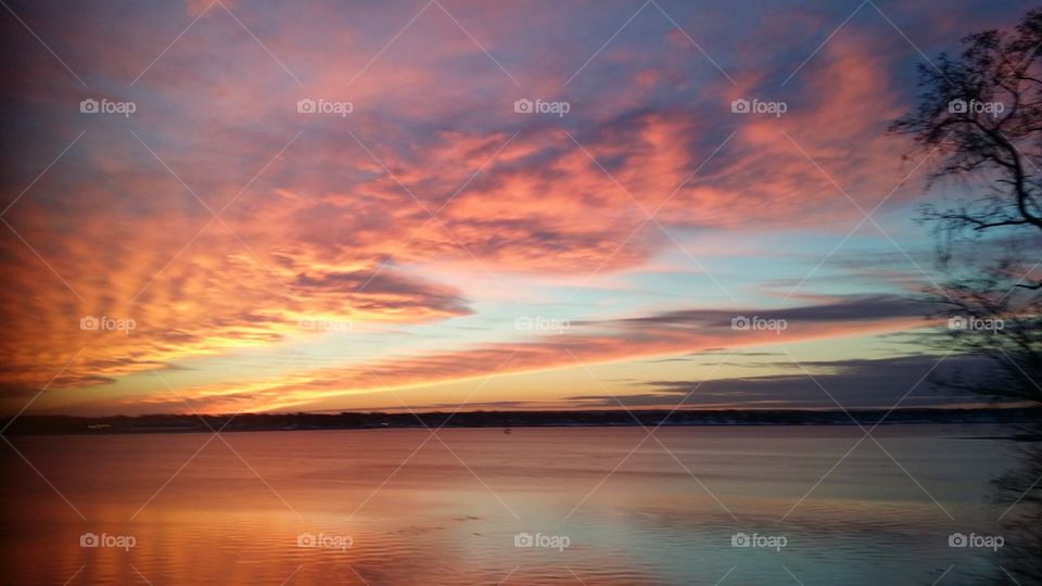sunsets by noel. facing west from my Home on the Bay