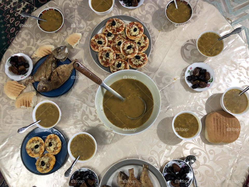 Moroccan table full of food in ramadan fasting month.