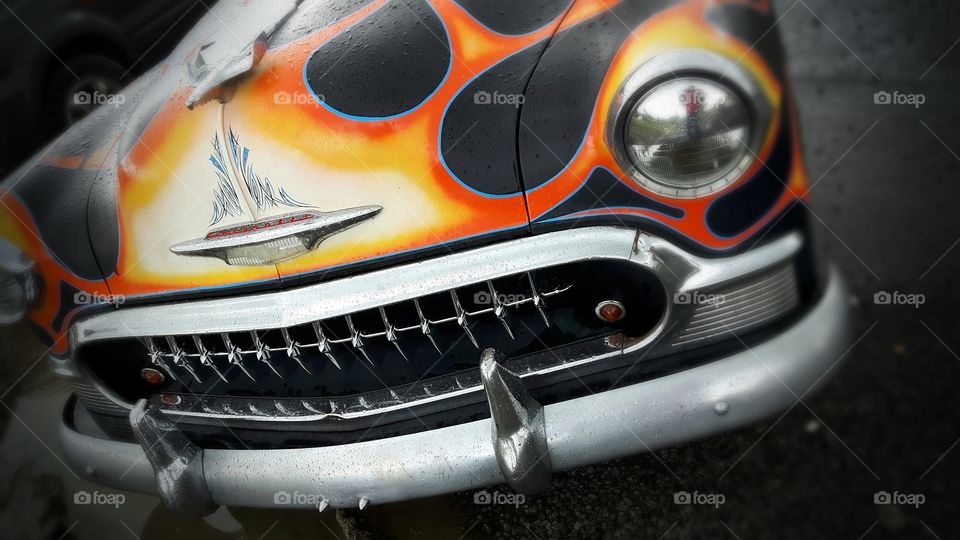 Classic car with flames paint job