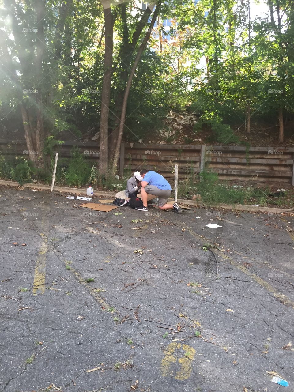 Prayer with a homeless man 