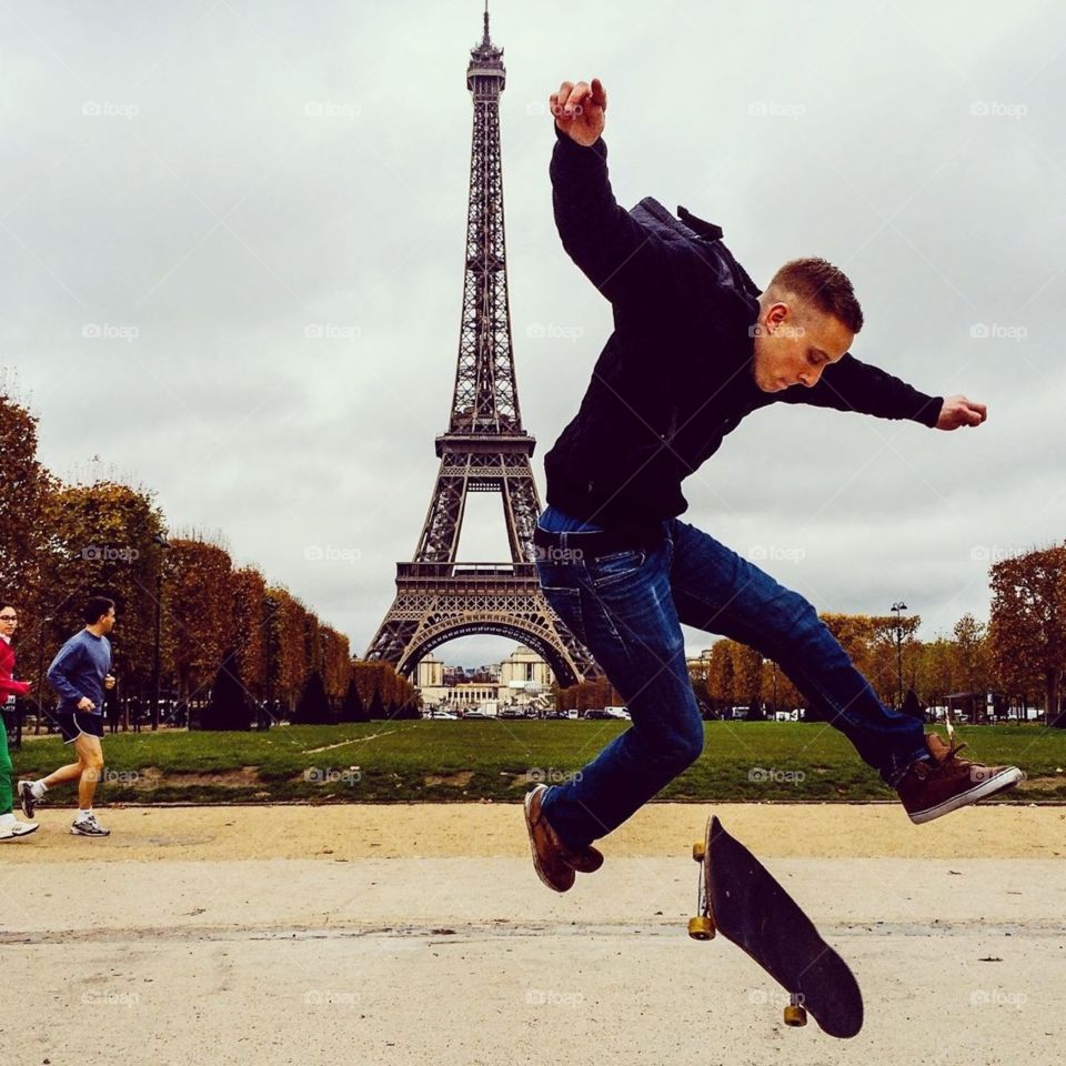 Skateboarding in Paris, France.  Trick: 360 Flip
