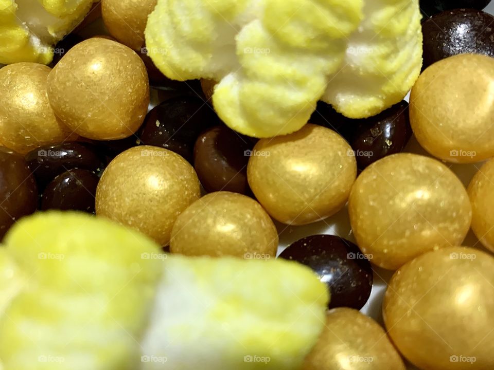 Sweets: candies, chocolate nuts, marshmallows and chewing dragees
