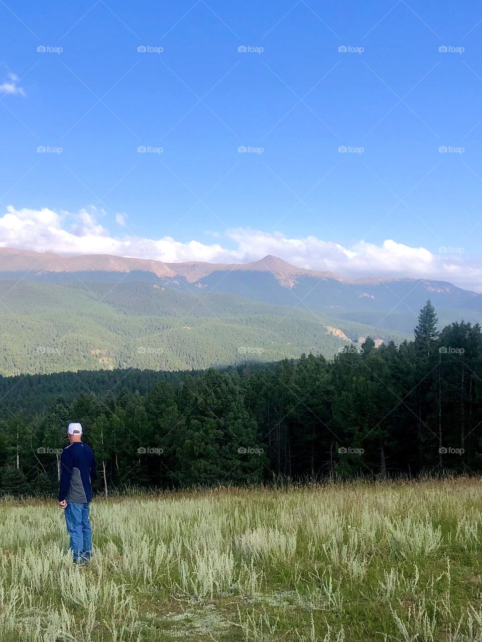 We vacationed to Colorado last year. Took a beautiful pic of the mountains and sky and can’t wait to go back this year!