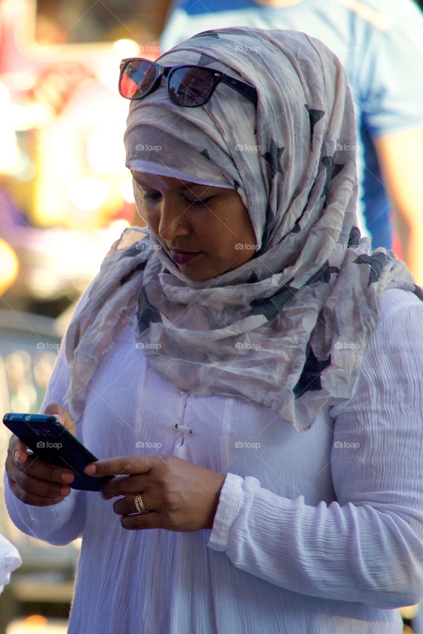 Portrait Of Woman Texting With Her  Phone