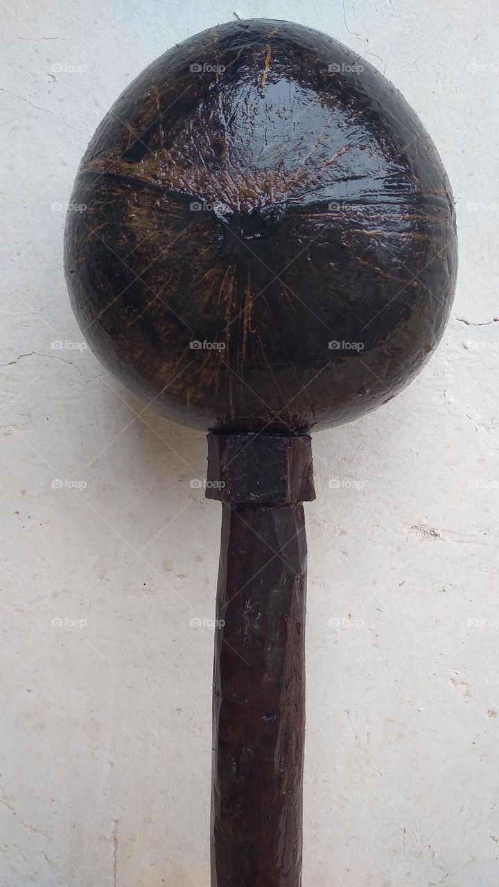 The ancient dipper is made of coconut skin and wood