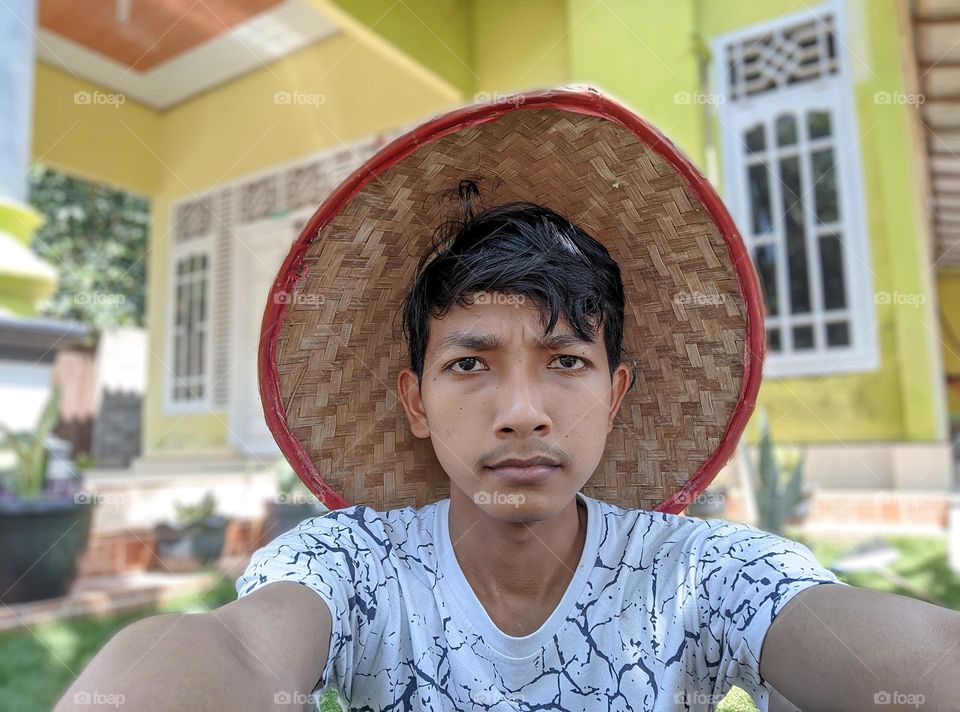 selfie photo wearing hat