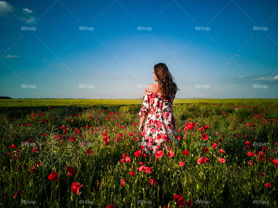Women in a field of flowers