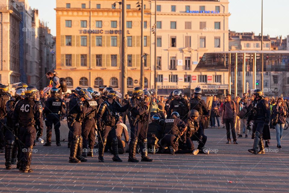 Group of CRS making an arrest during a demonstration of yellow vests in the Old Port of Marseille