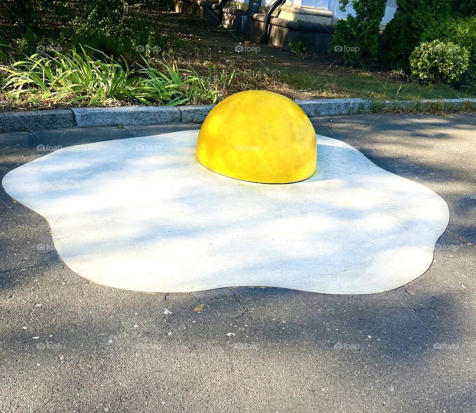 An unusual art object. Concrete hemispheres were designed in the form of an omelet.