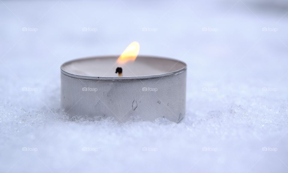 Candle light on snow