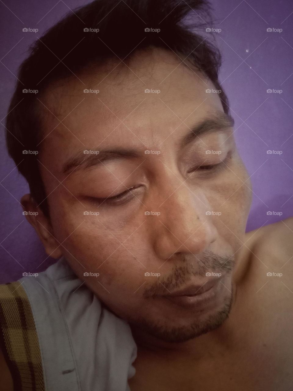 A mustache grows during puberty due to changes in androgen hormones and hair follicles on the face that respond to the hormone testosterone.