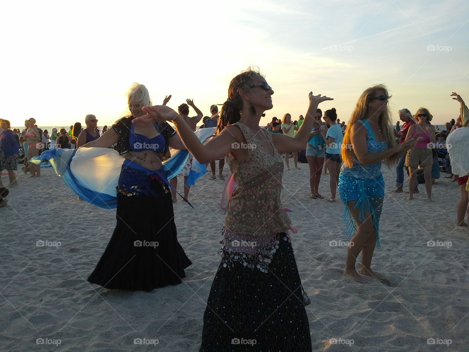 dancing on the beach. drum circle at siesta key beach