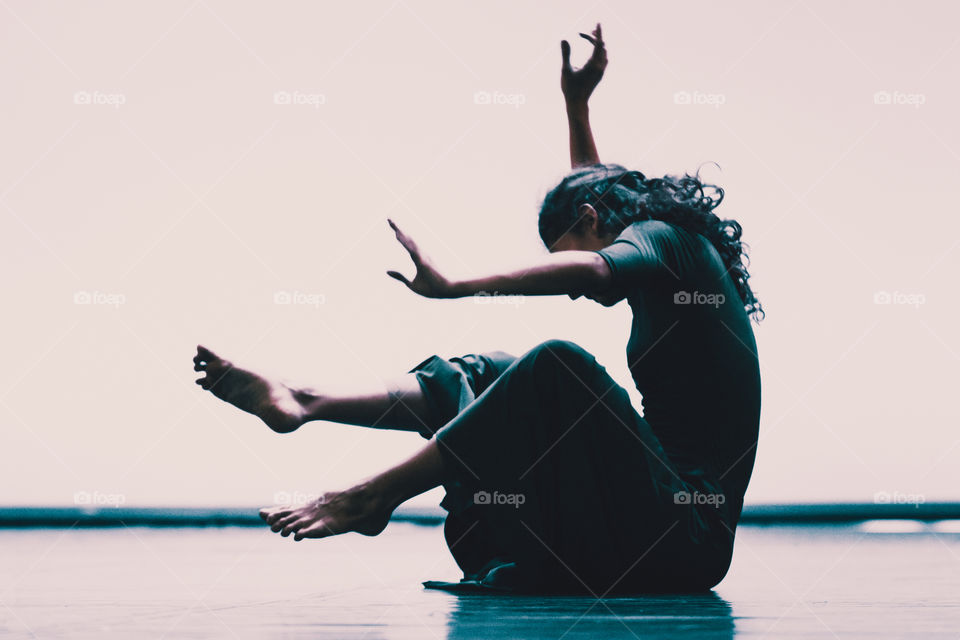 Young Woman Dancer On The Floor
