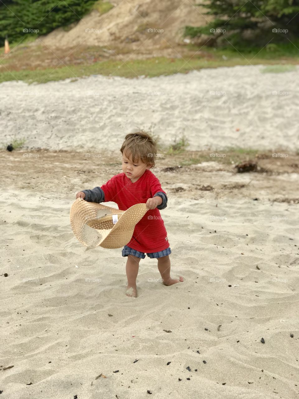 Awesome memories! At the beach with this hat and sand. Caught in the act! 😝