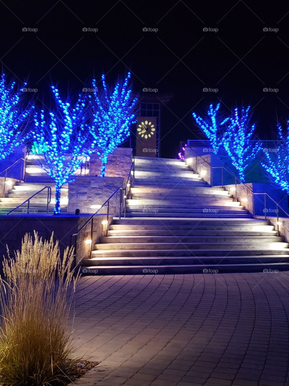stairway blue lighting and clocktower