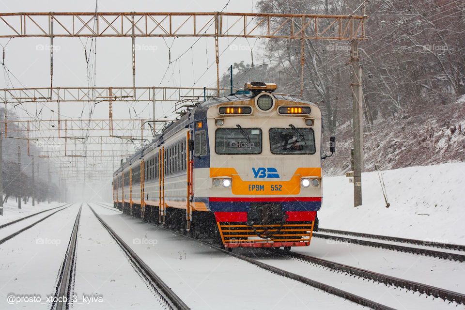 Kyiv city electric train on it’s route under the snowfall 🔥