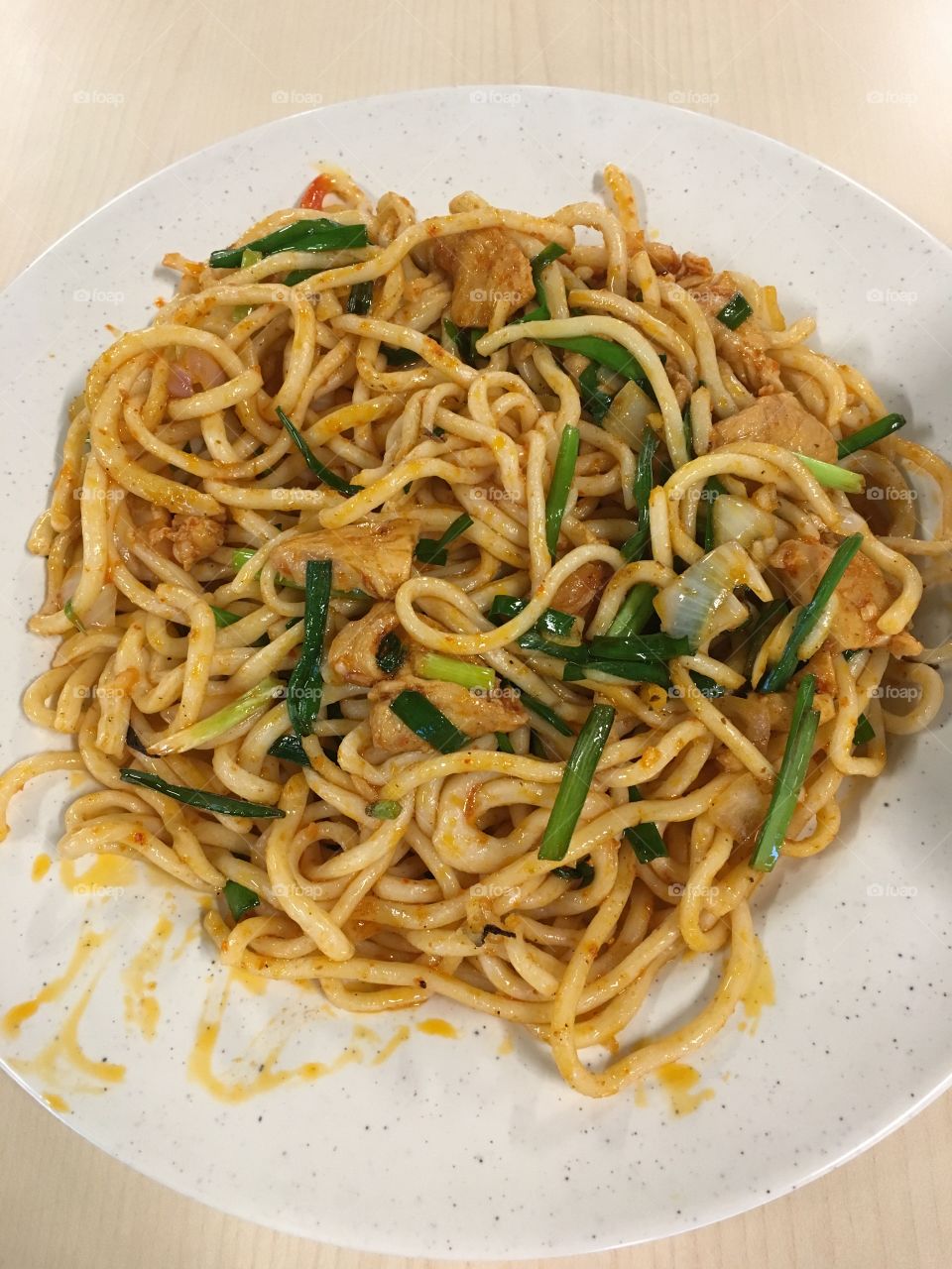 Spicy hand-pulled noodles with diced chicken
