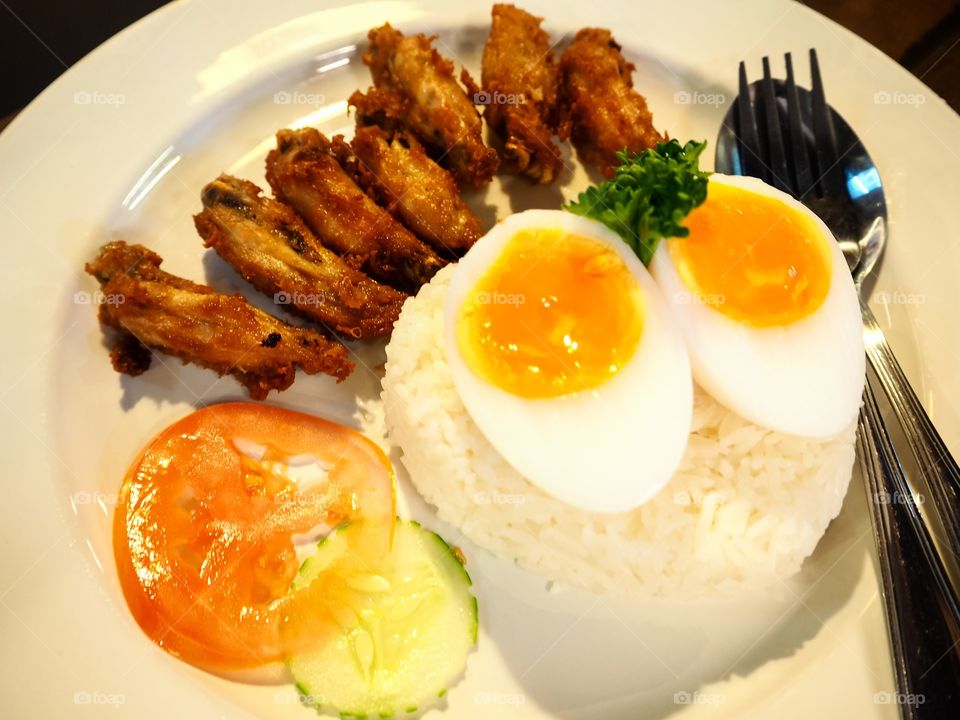 Heart shape rice with fried chicken and egg 