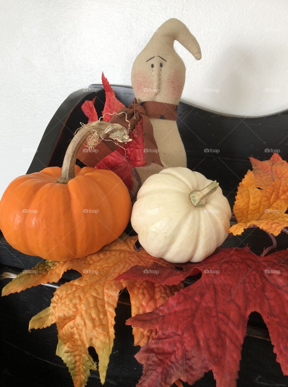 Halloween Primitive Ghost on a shelf with mini pumpkins and leaves Halloween decorations