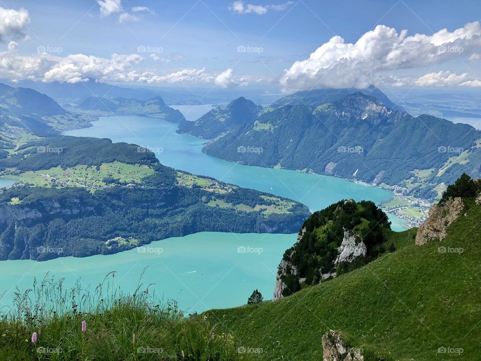 View of the lake, mountains and clouds