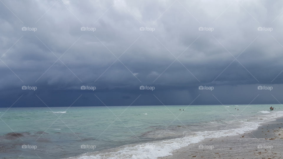 Storm clouds over beach