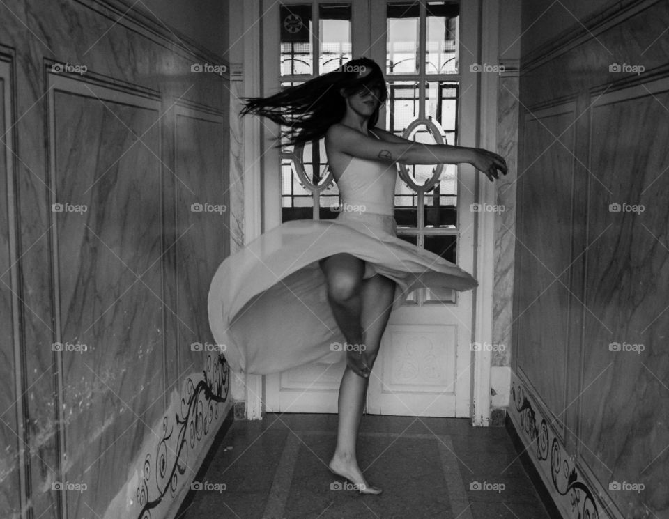 dancer black and white. in the room